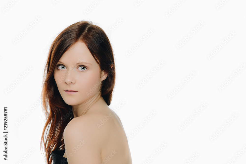 head shot of beautiful woman with blue eyes and dark red hair head shot of beautiful woman with blue eyes and dark red hair