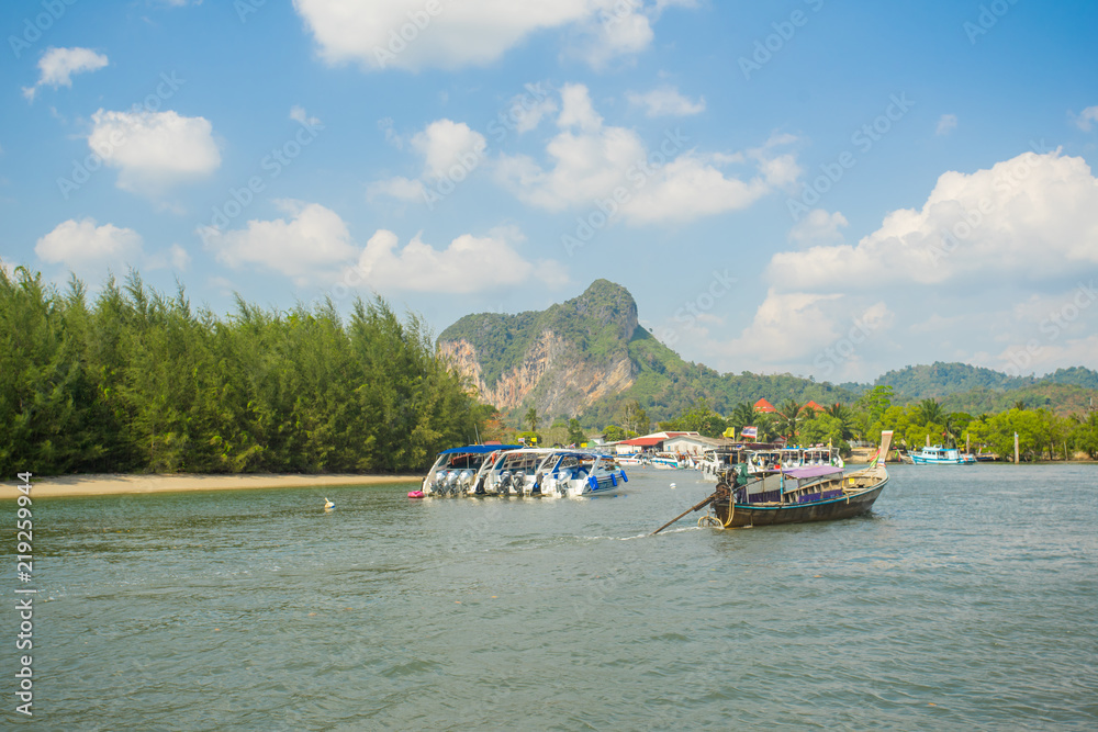 Boats and longtail boats moving to the Nopparat Thara port in Krabi Province Thailand.
