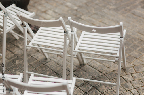 White chair on wedding ceremony. summer wedding decoration outside