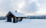 Old mountain cabin in winter landscape, Norway