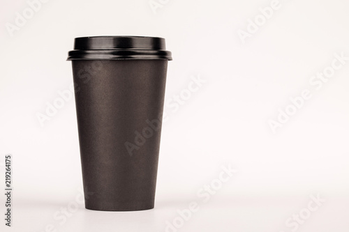 black paper Cup with a lid. Cup for coffee on white background.
