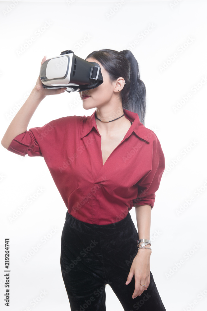 beautiful asian woman in red shirt showing VR equipment beautiful asian woman in red shirt showing VR equipment