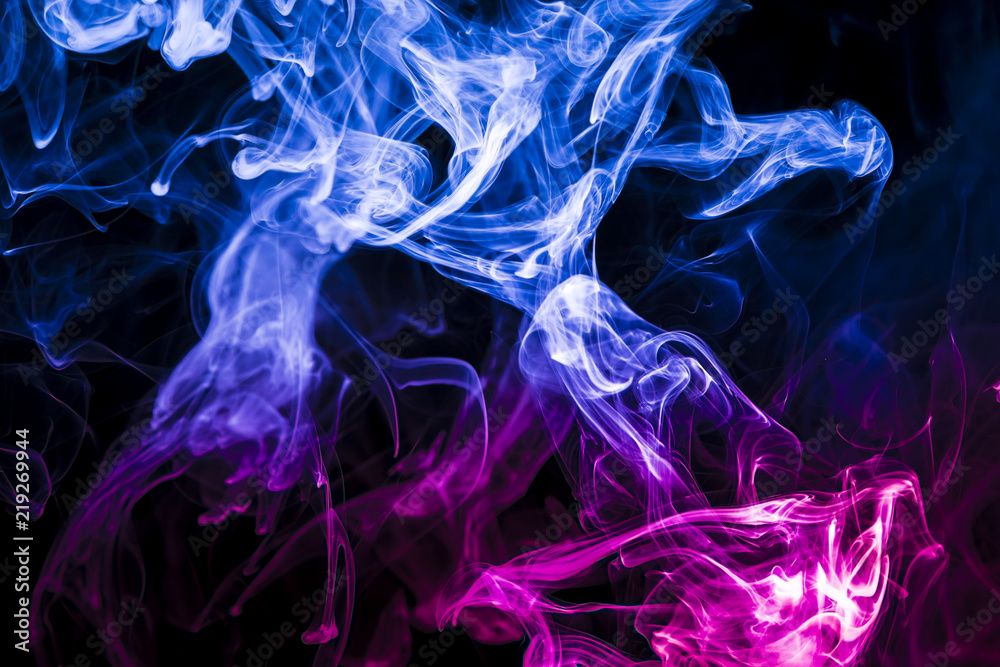 Colored smoke on black background