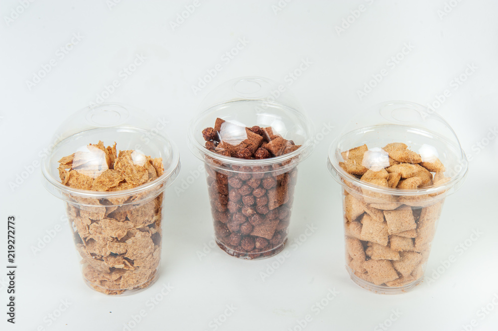 cereal breakfast in transperent boxes at white background cereal breakfast in transperent boxes at white background