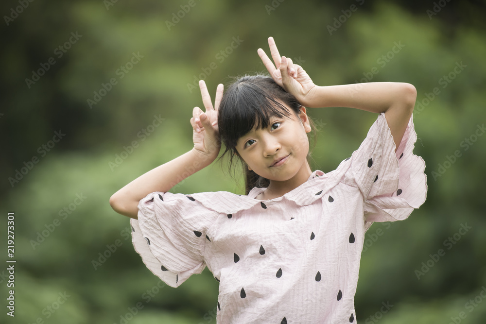 Portrait of Little Asian Girl Show Emotion Look at Camera Portrait of Little Asian Girl Show Emotion Look at Camera