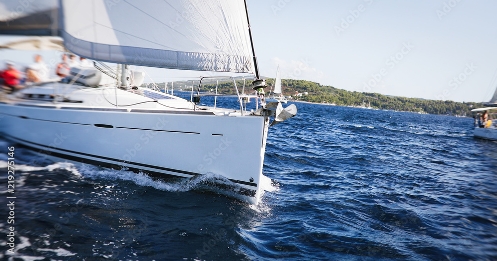 Fototapeta premium Nice view to nacht sailing in open sea at windy day