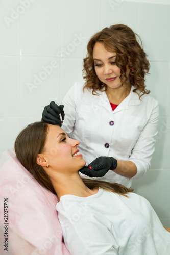 beautiful young girl at a reception at a beautician in a beauty salon