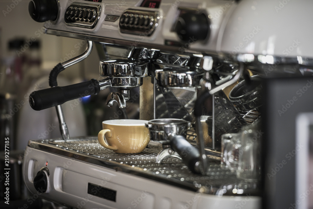 Coffee machine with coffee cup at cafe Coffee machine with coffee cup at cafe