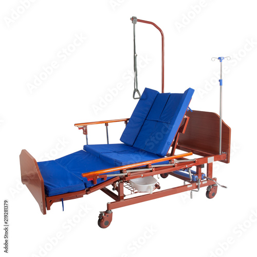 Medical brown metal bed on wheels with blue mattress and accessories isolated on white background