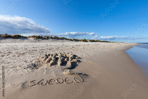 Deserted beach in Sandhammaren, Sweden. photo