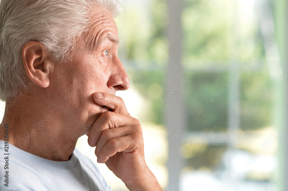 Portrait of Sad senior man at home Portrait of Sad senior man at home