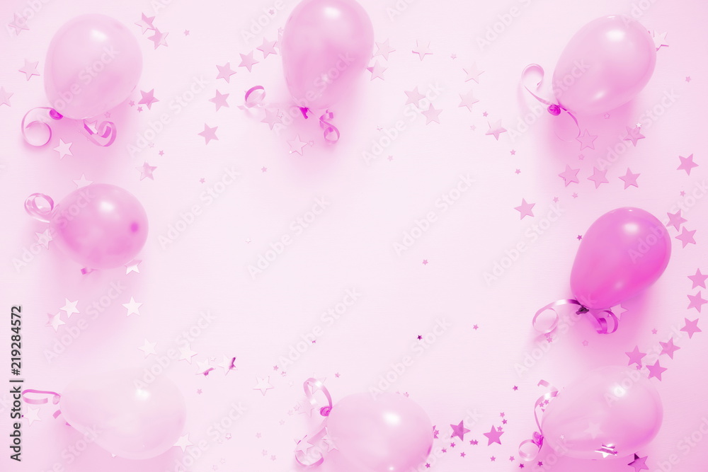 Festive pink background. Shining stars and balloons on light lilac pastel background. Christmas. Wedding. Birthday. Happy woman's day. Mothers Day. Valentine's Day. Flat lay, top view Festive pink background. Shining stars and balloons on light lilac pastel background. Christmas. Wedding. Birthday. Happy woman's day. Mothers Day. Valentine's Day. Flat lay, top view