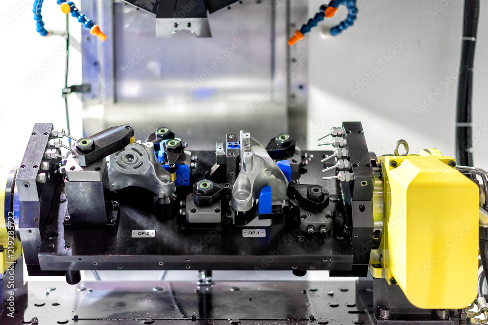 High precision CNC machining center working, operator machining automotive sample part process in factory High precision CNC machining center working, operator machining automotive sample part process in factory