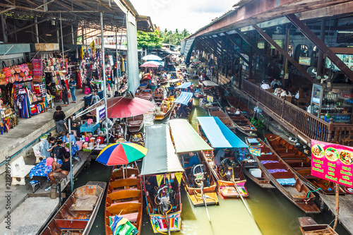 People at Damnoen saduak floating market. photo