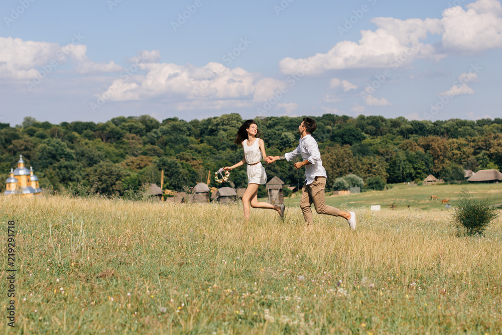  lovers running in the field