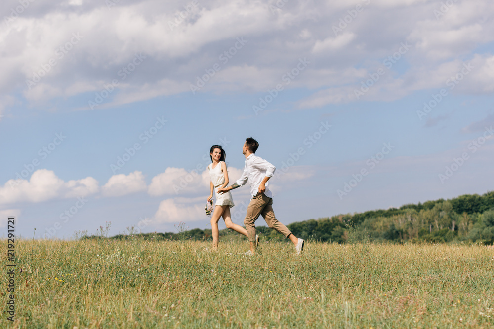  lovers running in the field