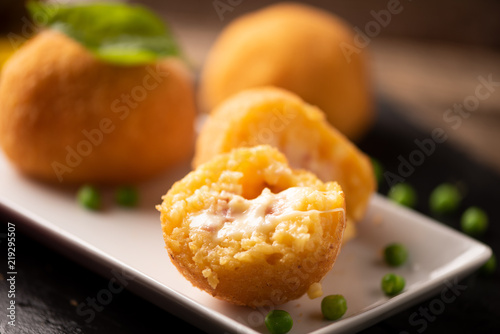 arancini di riso, fried risotto rice balls, italian sicilian food photo