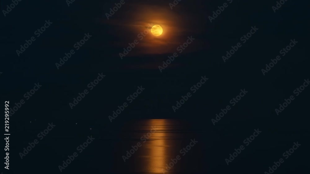 Super full blood moon and moonlight over sea in Samui, Thailand. Timelapse 4K Super full blood moon and moonlight over sea in Samui, Thailand. Timelapse 4K