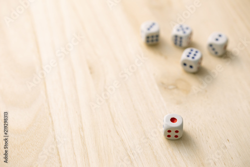 Photography Rolling the dice on a wooden surface