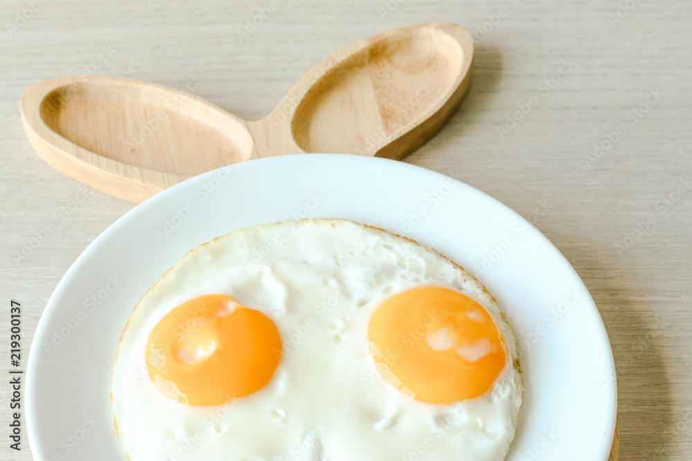 sunny side up of double egg ready to serve. sunny side up of double egg ready to serve.