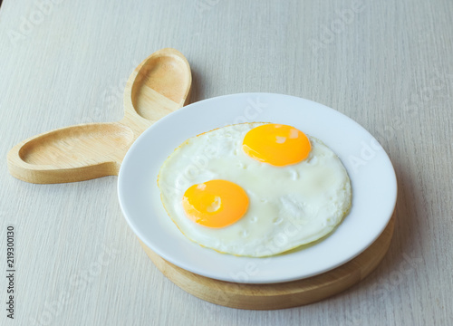 sunny side up of double egg ready to serve. photo