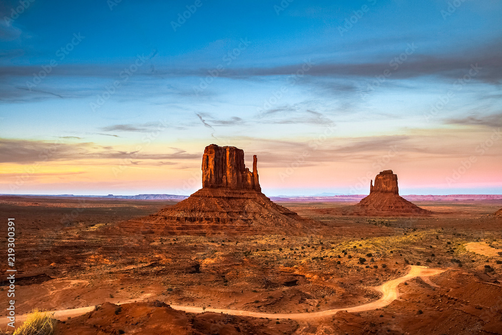 Naklejka premium The West and East Mittens Butte in Monument Valley Navajo Tribal Park at dusk, Arizona, USA.