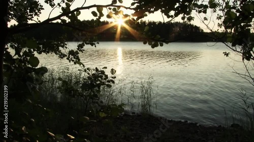 Finland lake with backlight sunshine 