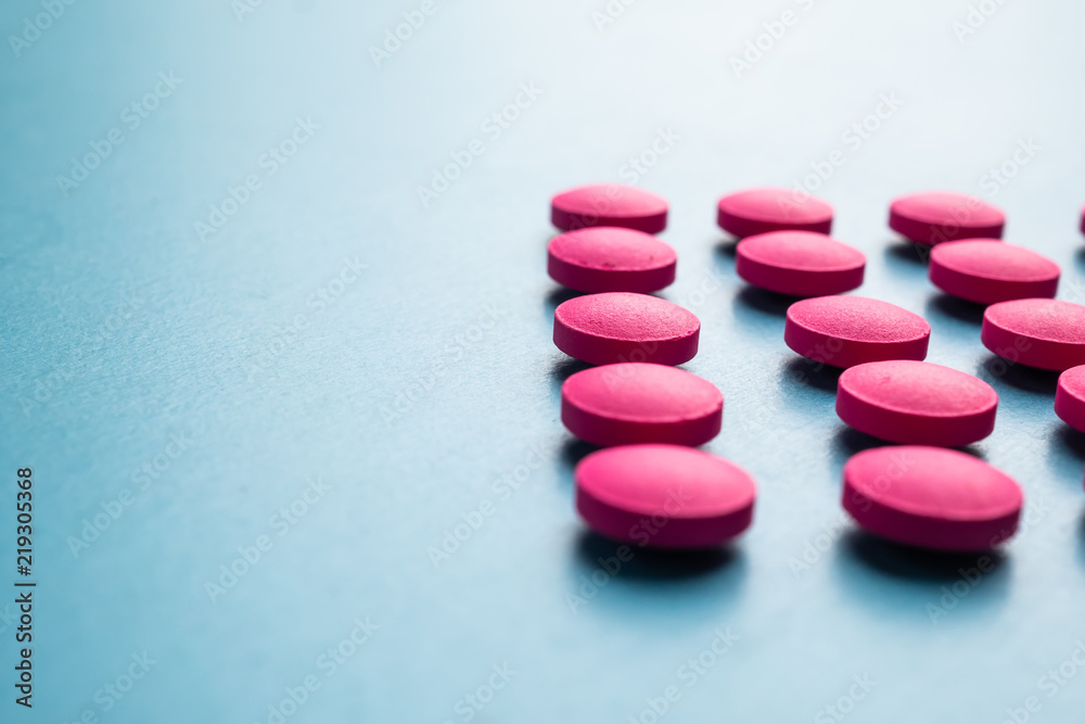 pill drug medical on blue background copy space pill drug medical on blue background copy space