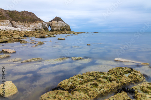 Filey bay Beach on Yorkshire coast near Reighton Gap and Speeton at sunrise photo