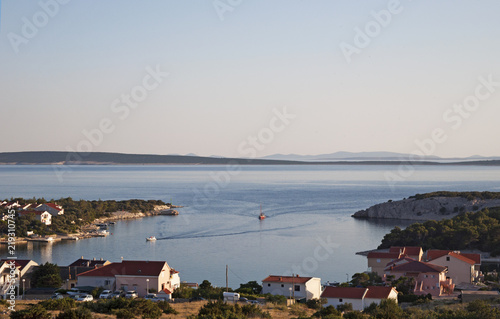 Croazia: vista panoramica al tramonto della macchia mediterranea e del porto di Gajac, un paesino sperduto sull'isola di Pago nel mare Adriatico settentrionale photo