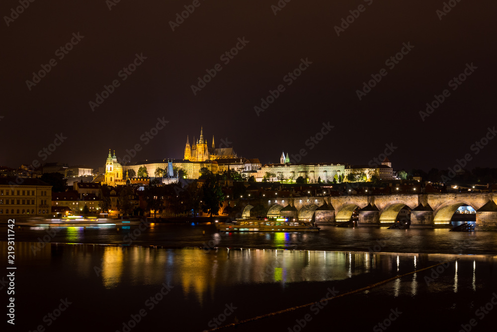 Night scenery of Vltava riverside, Charles bridge, Saint Vitus Cathedral, Prague castle and old town Prague, Czech Republic.