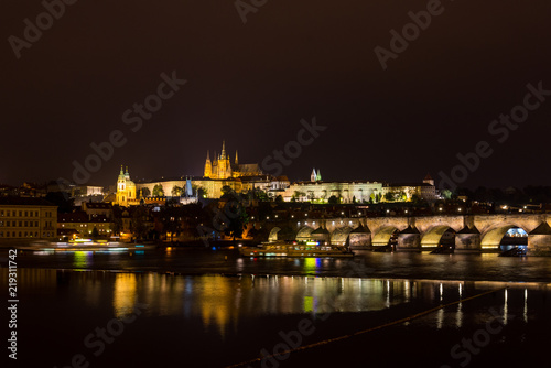 Night scenery of Vltava riverside, Charles bridge, Saint Vitus Cathedral, Prague castle and old town Prague, Czech Republic.