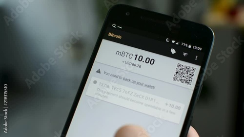 Bitcoin wallet balance on mobile phone smartphone screen, be your own bank concept