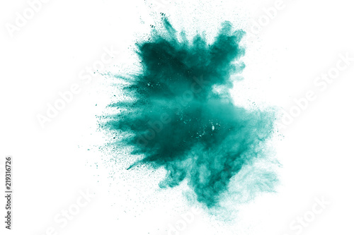 green color powder explosion cloud isolated on white background.Green dust splash on  background.