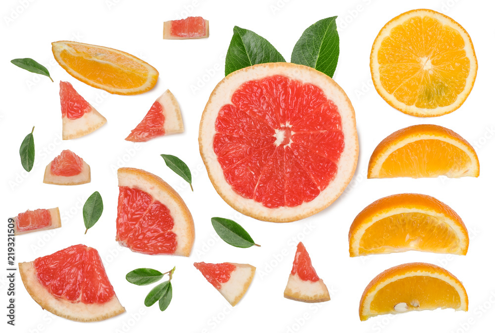 Sliced pieces of grapefruit, orange, lemon isolated on white, top view Sliced pieces of grapefruit, orange, lemon isolated on white, top view