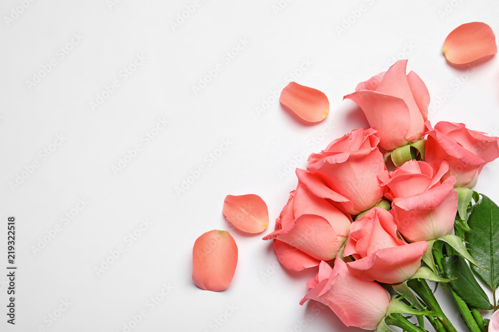 Bouquet of beautiful roses on white background
