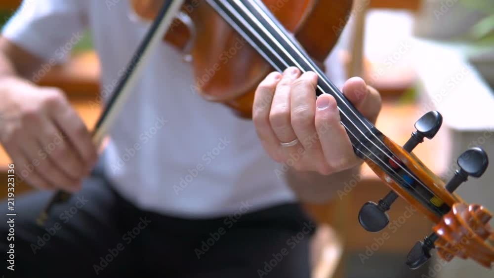 Close-up of musician playing violin, classic music