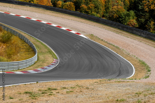 View on empty race track circuit with red white curbs motorsport concept racing background
