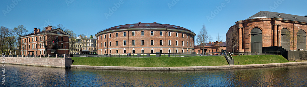 Group of buildings of red brick on the island of New Holland in the city of St. Petersburg