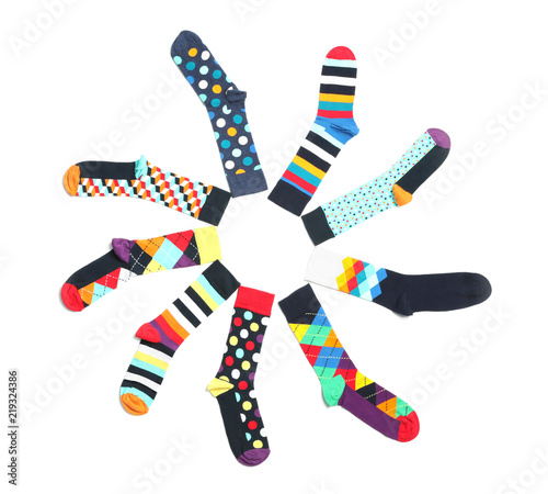 Flat lay composition with different colorful socks on white background