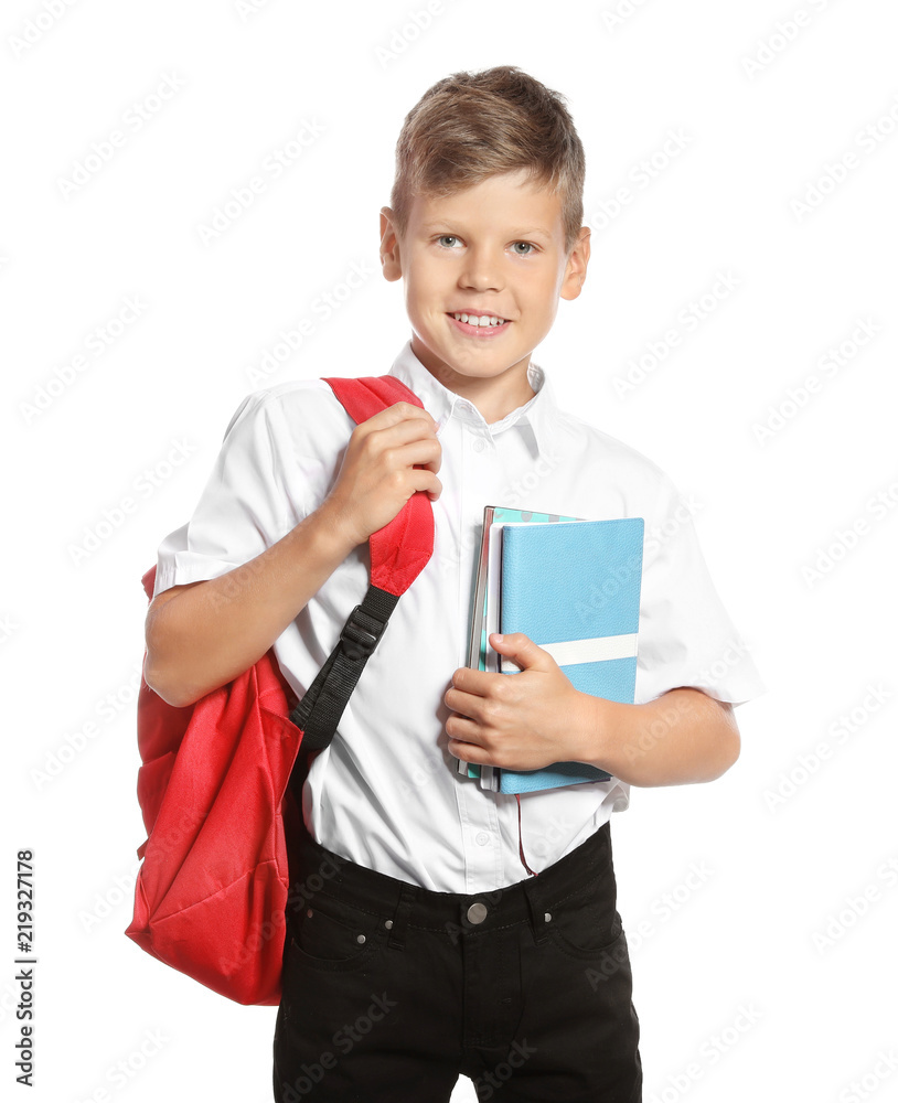Cute boy with school stationery on white background Cute boy with school stationery on white background