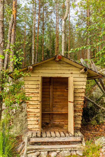 Deatil of an old wooden changing cabin on the shore of the Saimaa lake in Finland - 1
