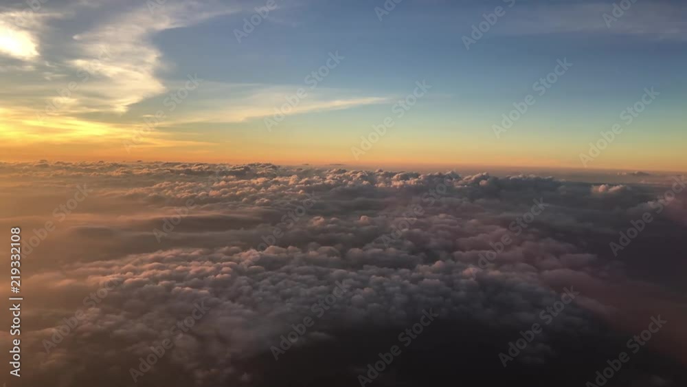 Sunset above the clouds flying away from Phuket Thailand Sunset above the clouds flying away from Phuket Thailand