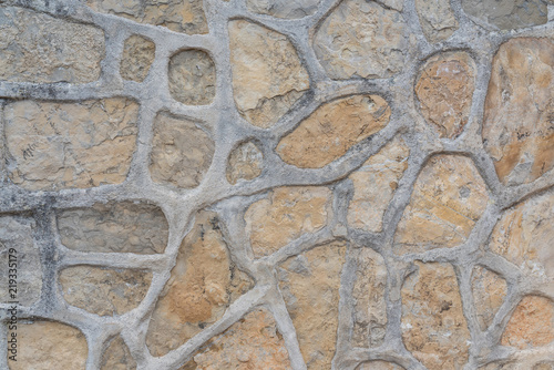 close-up shot of natural stone wall background texture