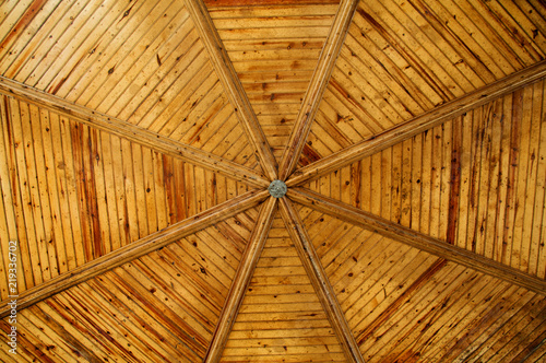 Fototapeta Naklejka Na Ścianę i Meble -  Wooden roof of pavilion, closeup, day time