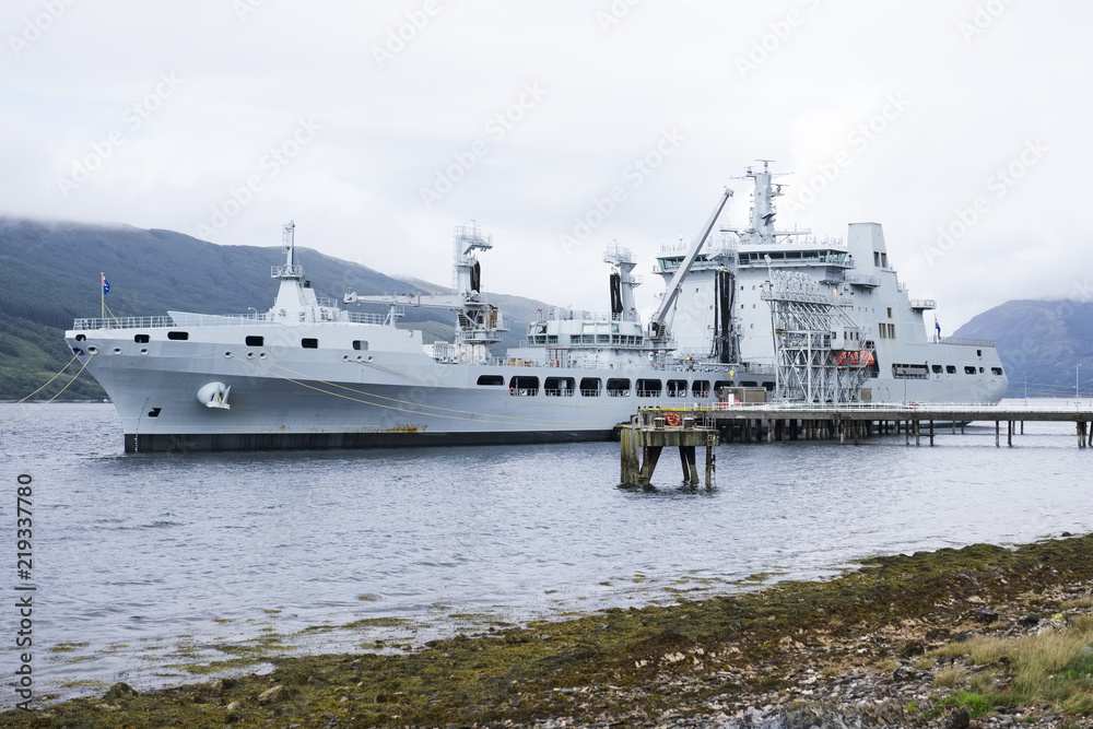 Grey battleship British royal fleet docked at naval base in Scotland Grey battleship British royal fleet docked at naval base in Scotland