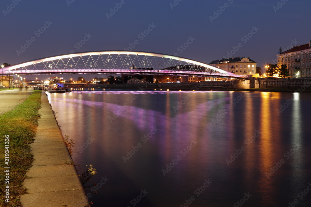 Naklejka premium Kladka Ojca Bernatka, Bridge in Krakow, Kazimierz, night