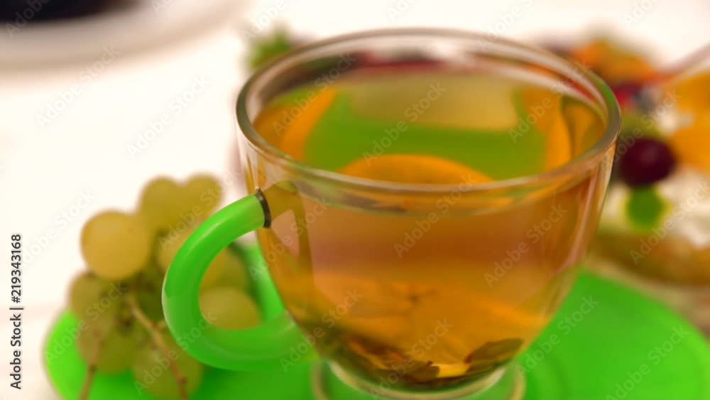 Elegant glass cup of hot lemon tea Elegant glass cup of hot lemon tea