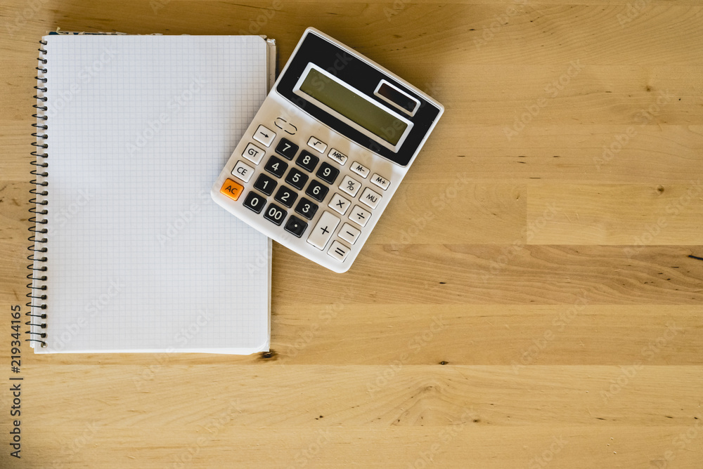 Calculator and pad to calculate business expenses Calculator and pad to calculate business expenses
