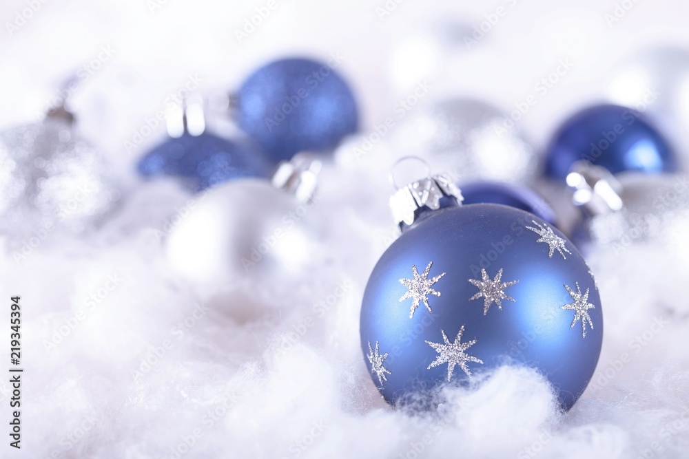 Blue and White Christmas Baubles on the Wadding on the Grey Stock Photo |  Adobe Stock